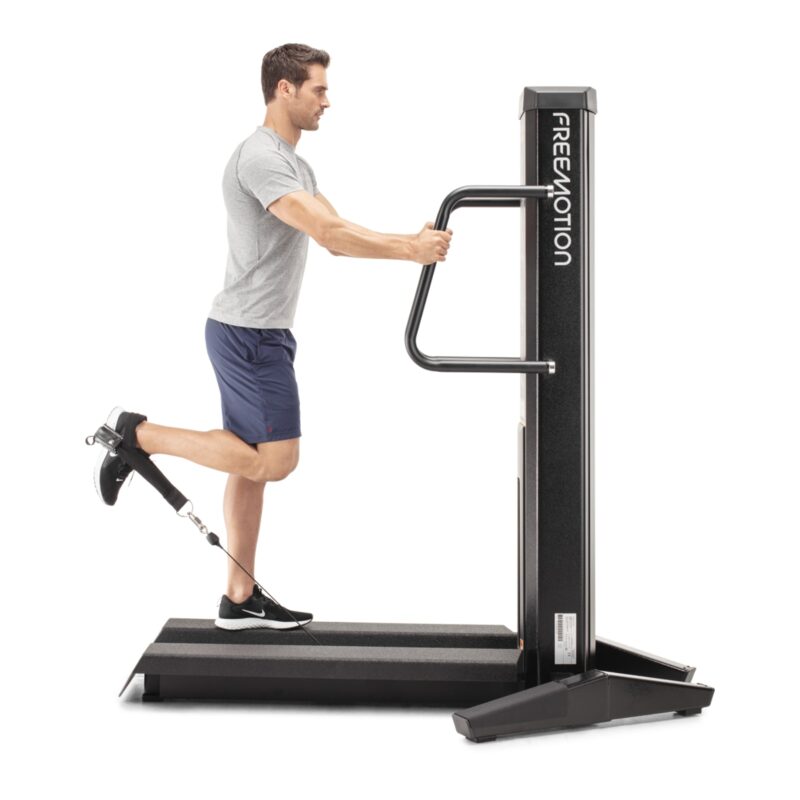 FREEMOTION MASZYNA DO ĆWICZENIA MIĘŚNI POŚLADKOWYCH I DWUGŁOWYCH UD - obrazek 10